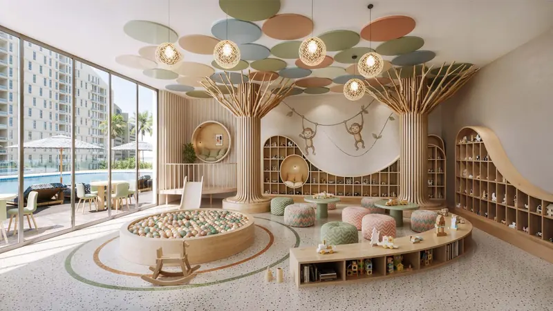 Kids' room with a sculpted tree canopy and ball pit